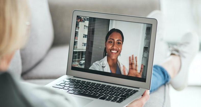 Virtual visit with doctor on laptop